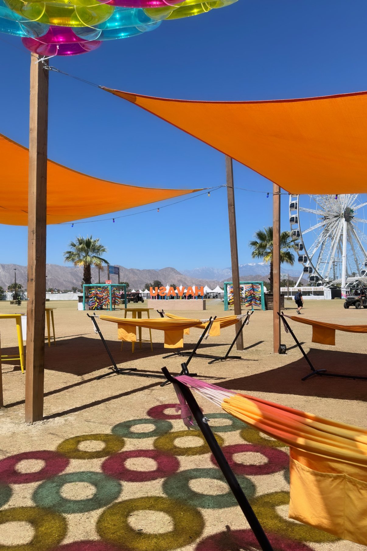 Havasu lounge hammocks under orange shade sails