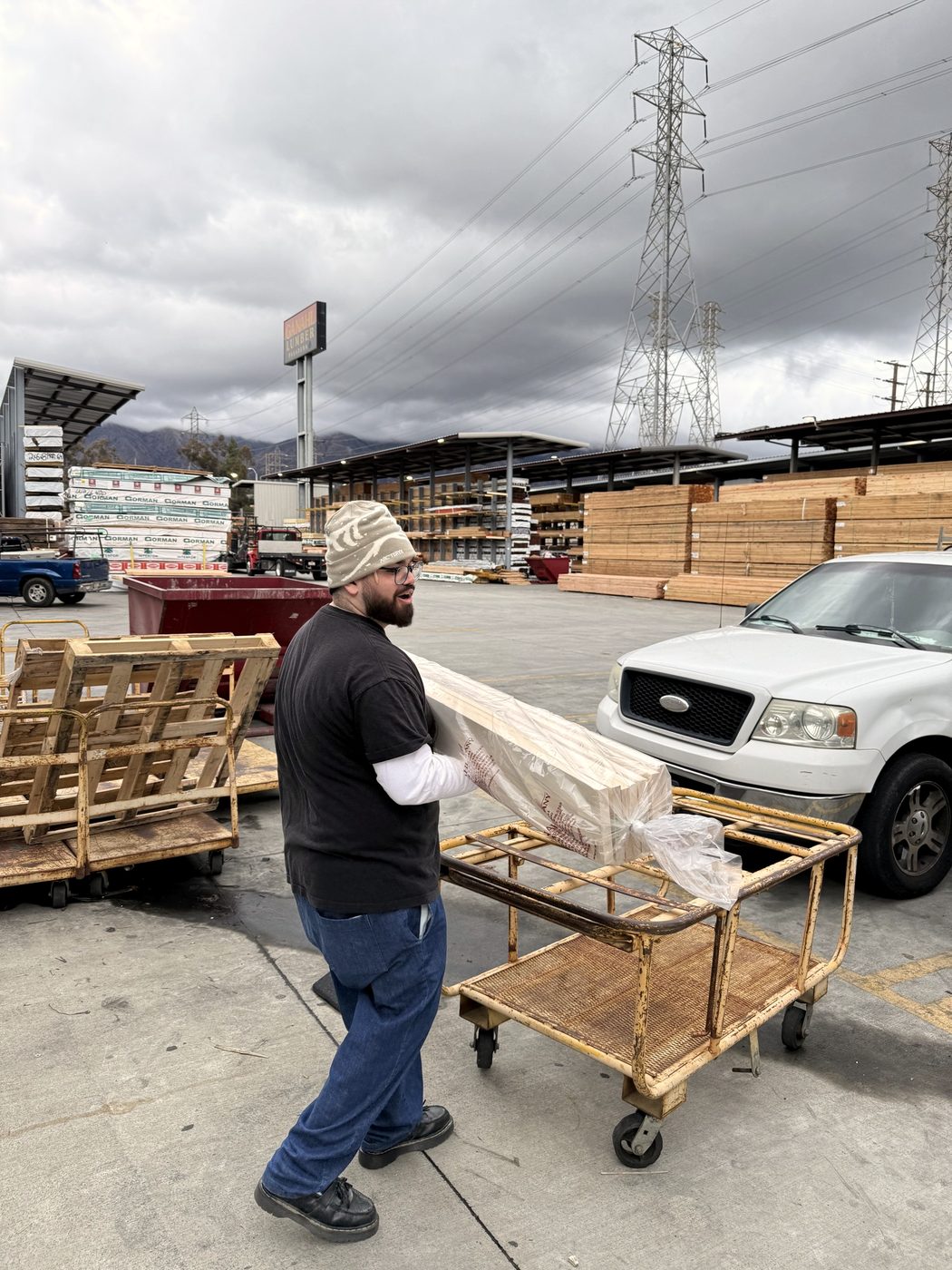 Carrying lumber out of the yard